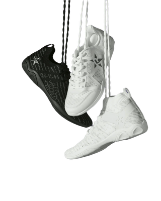 Rebel cheer shoes danging down by laces onto puple background. 2 white cheer shoes one black cheer shoe