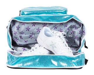A light blue glittery backpack with an open compartment revealing a purple star-patterned interior, storing a pair of white shoes with a star logo.