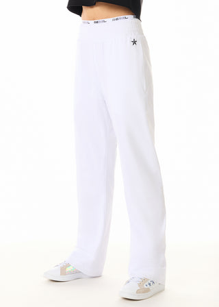 White pants with a star design on a white background