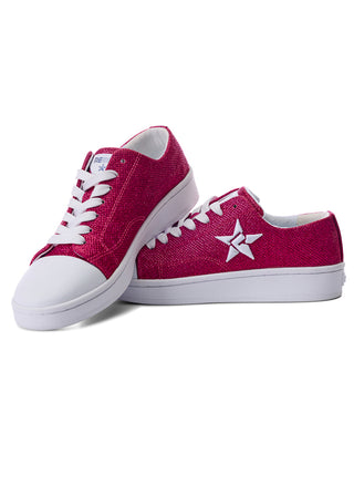 Pink sneakers with white laces and sole on a white background